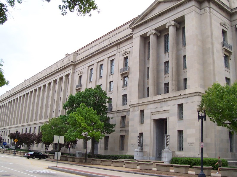 U.S. Department of Justice building representing federal enforcement